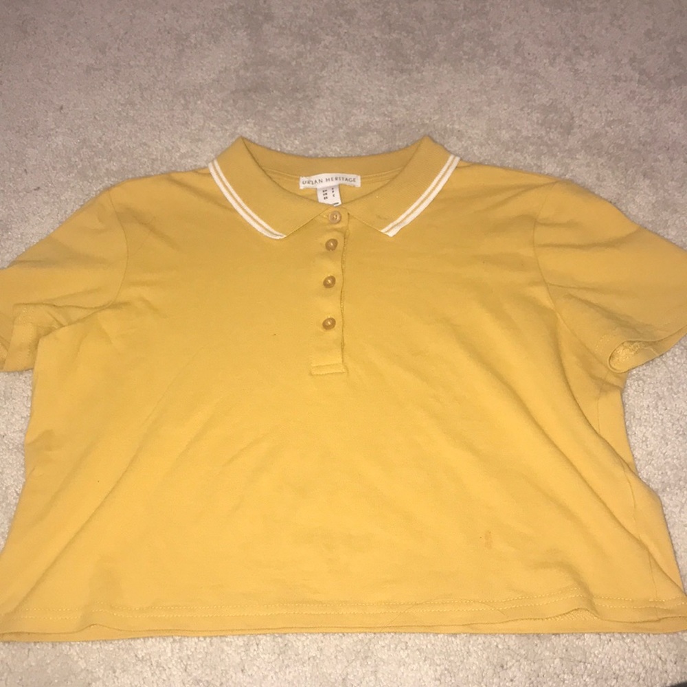 Yellow collared tee shirt